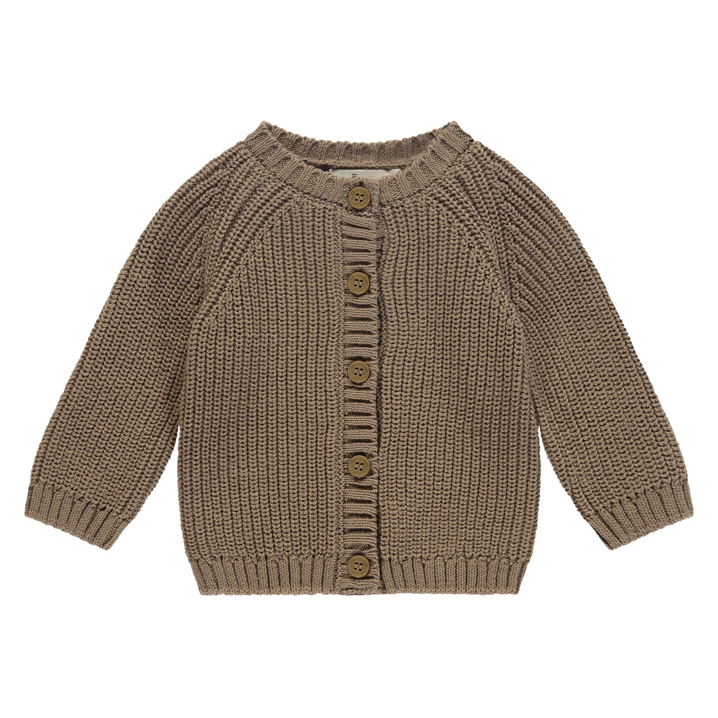 Een bruin vestje met knoopjes