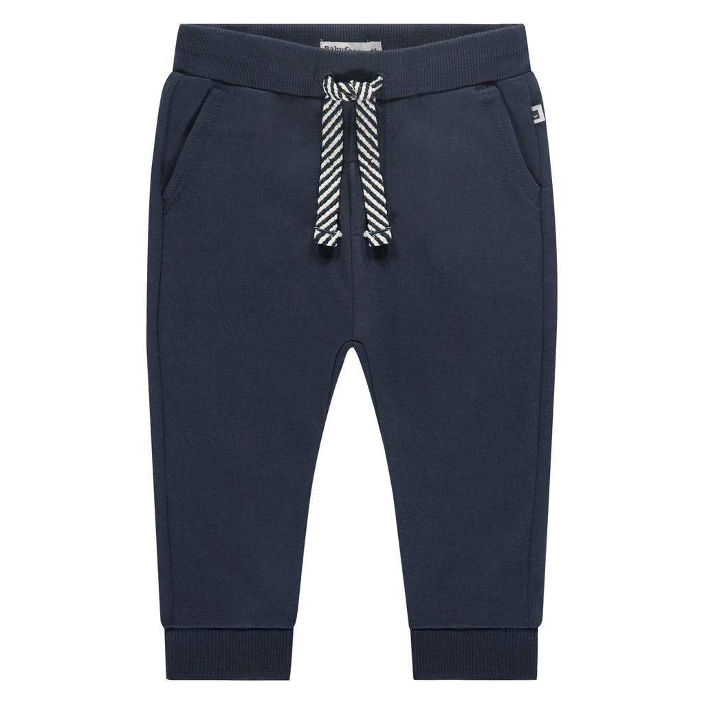Een donkerblauw babybroekje met veter