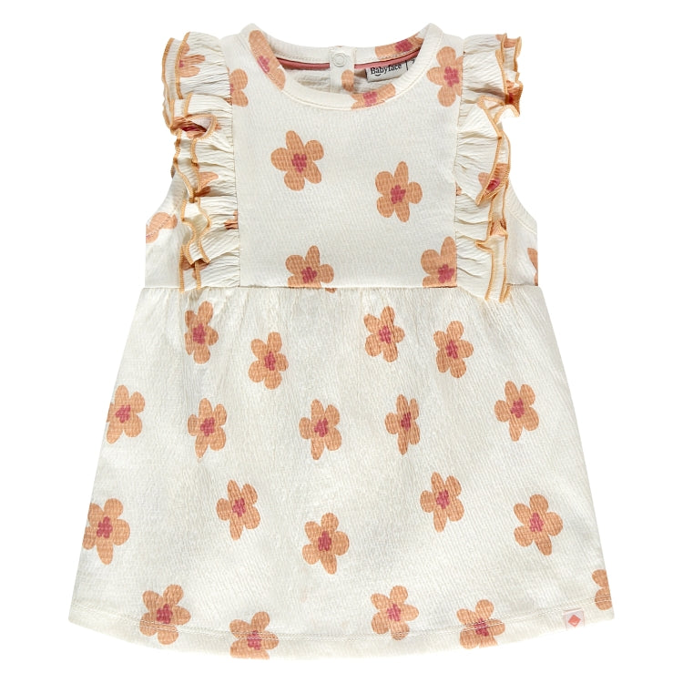 Een wit jurkje met beige kleurige bloemetjes