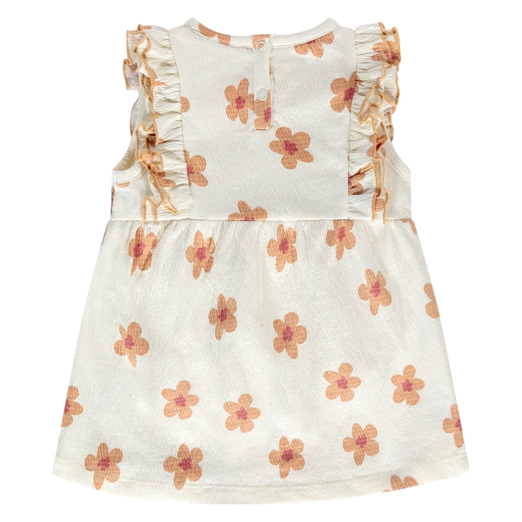 Een wit jurkje met beige kleurige bloemetjes