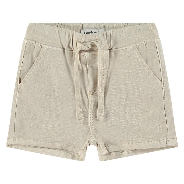 Een beige korte baby broek 