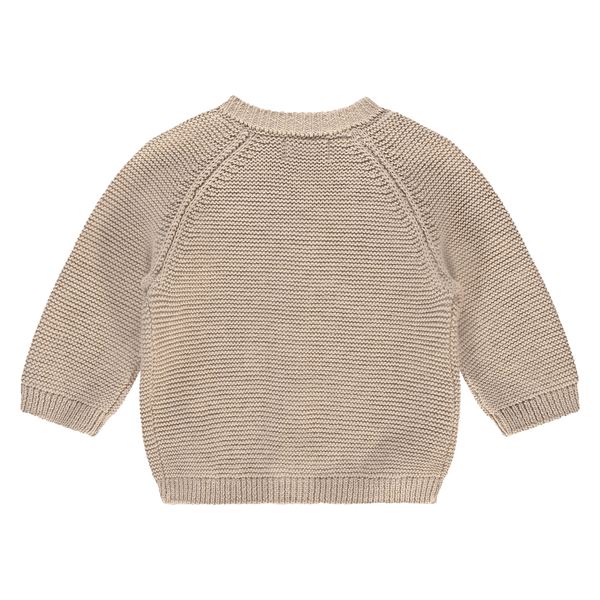 De achterkant van een beige kleurig vestje voor baby's
