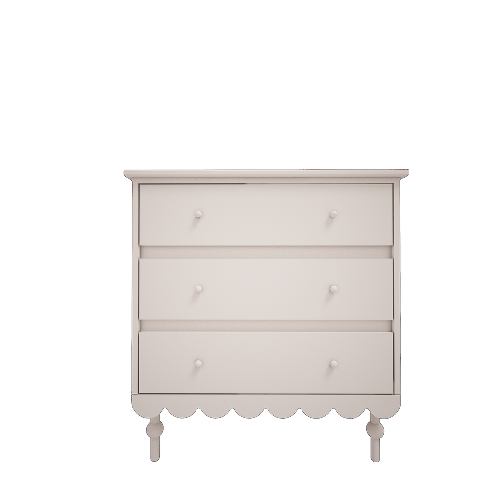 Een witte commode met drie ruime lades