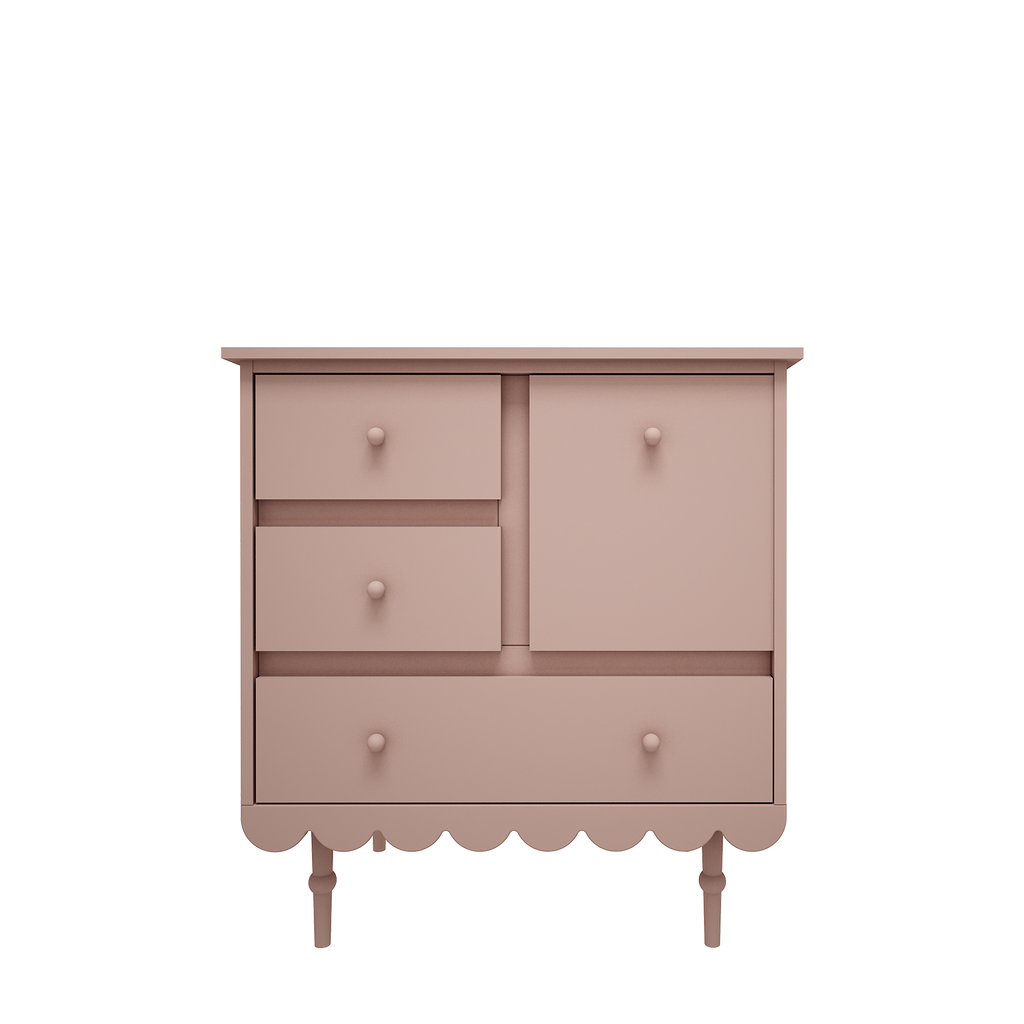 En roze commode in retrostijl met 3 lades en leggedeelte