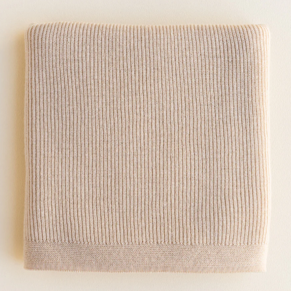 Hvid Babydeken handgemaakt van 100% merinowol. In de kleur oat, rood en otter.