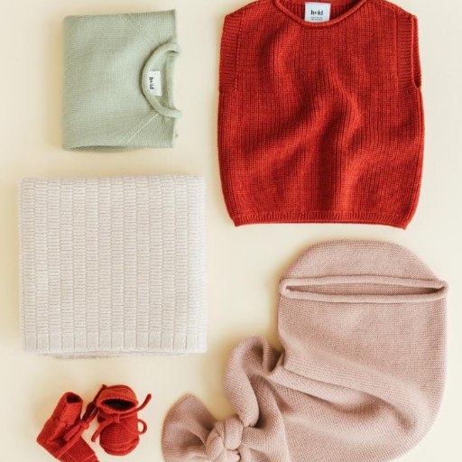 Hvid Booties van merinowol in de kleur rood. Verkrijgbaar in verschillende kleuren.