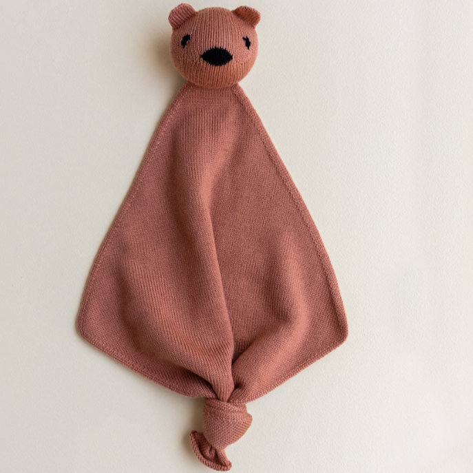 Hvid knuffeldoekje gemaakt van merinowol in verschillende kleuren. 