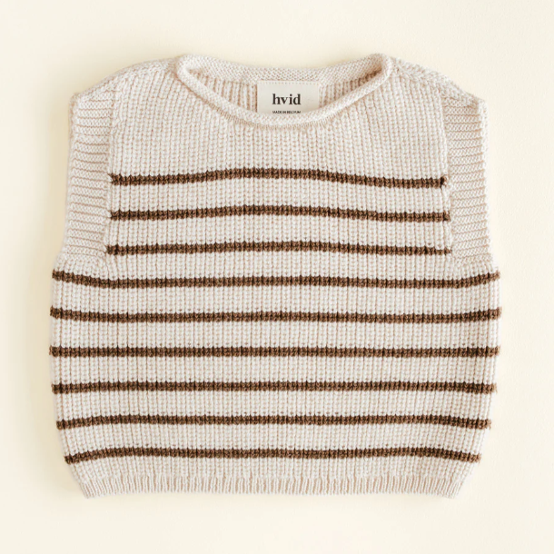 Hvid vestje Harvey in de kleur cream mocha gemaakt van 100% merinwol. Maat 0-6 maanden en 6-12 maanden.