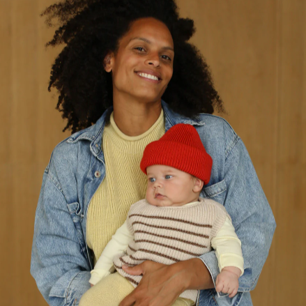 Hvid vestje Harvey in de kleur cream mocha gemaakt van 100% merinwol. Maat 0-6 maanden en 6-12 maanden.