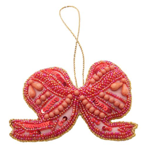 Kersthanger versierd met glinsterende kraaltjes en fonkelende pailletten.