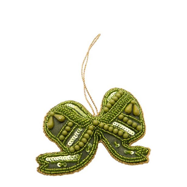 Kersthanger rijkelijk versierd met glinsterende kraaltjes en fonkelende pailletten.