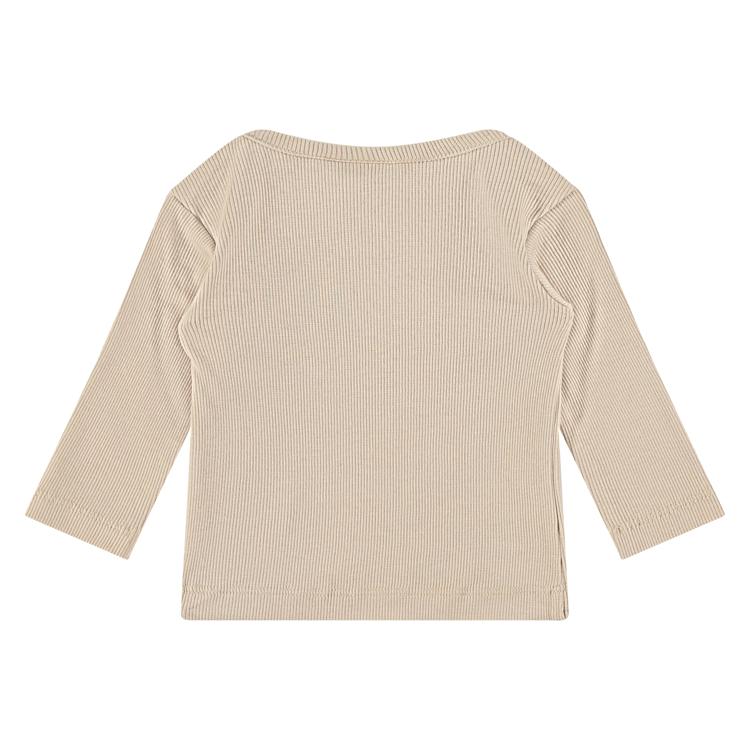 Een beige baby truitje