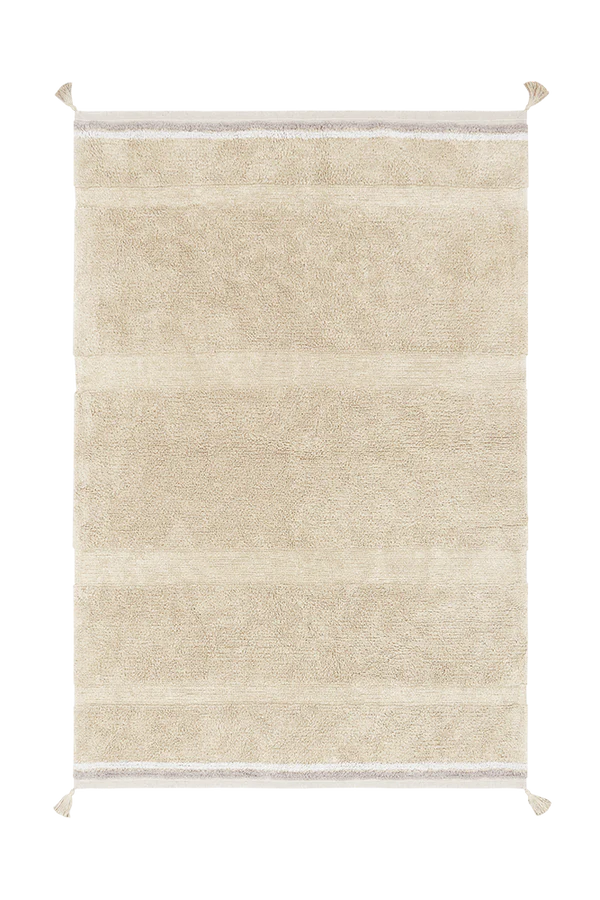 Lorena Canals Machine wasbaar vloerkleed in een goud gele kleur met kwastjes op de hoeken. Rechthoekig kleed in verschillende formaten.