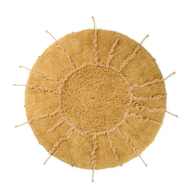 Lorena Canals machine wasbaar vloerkleed in de vorm van een zon. Goud geel van kleur. 