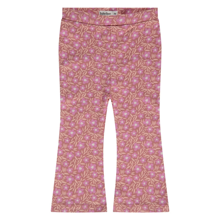 Een roze baby flared legging met bloemetjes