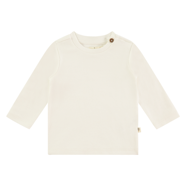 Een witte long sleeve met een knoopje op de schouder
