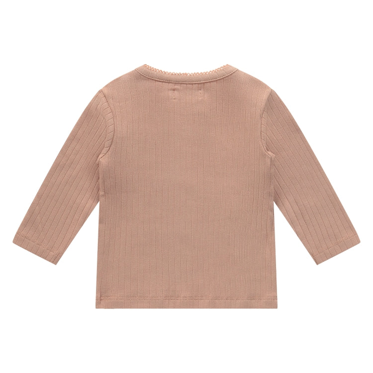 Een koraalkleurige longsleeve