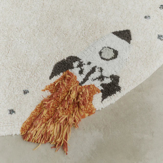 Een spaceshuttle op een vloerkleed