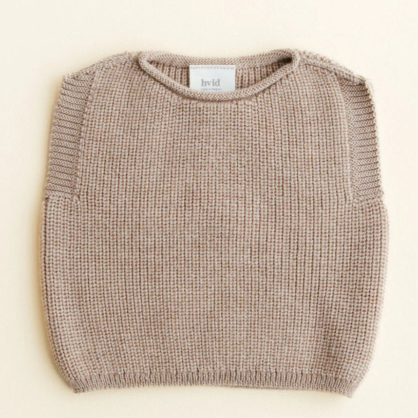 Een beige spenser voor baby's