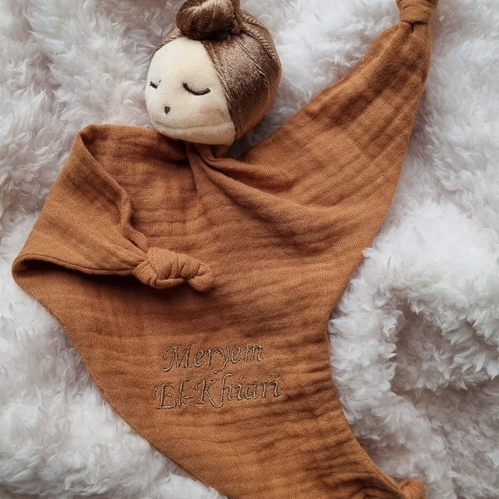 Gepersonaliseerd knuffeldoekje beige, een beige doekje met een hoofdje erop.