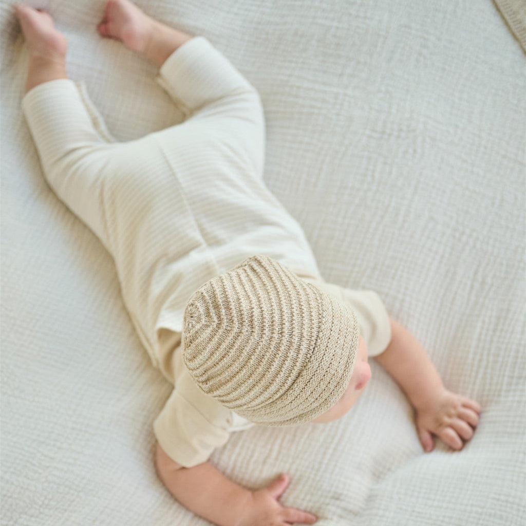 Petite Maison Baby Mutsje van katoen in de kleuren beige, outmeal, offwhite, roze. In maat 56,56,62,68.