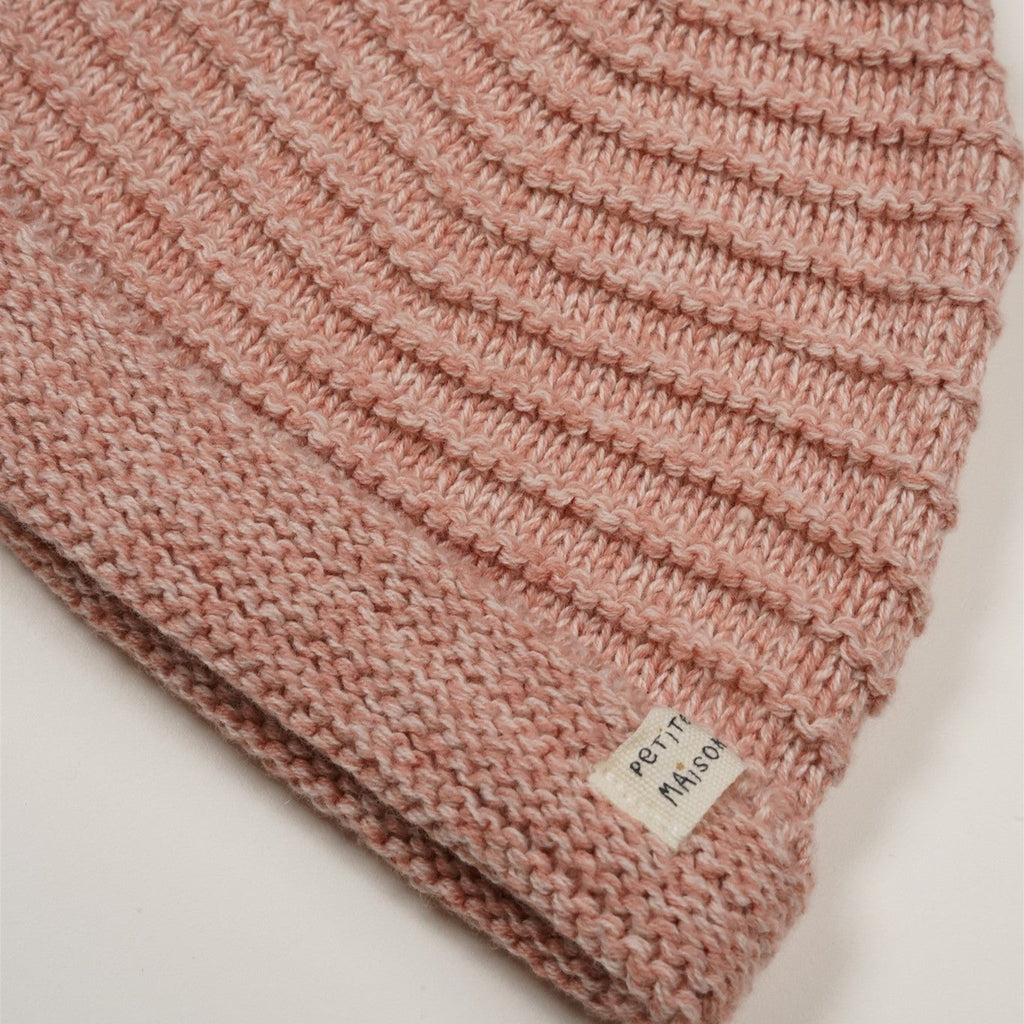 Petite Maison Baby Mutsje Riri verkrijgbaar in Offwhite, Beige en Roze in maat 50,56,62,68.