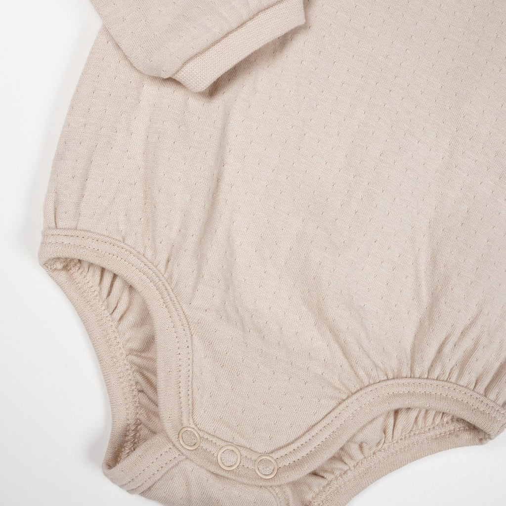 Petite Maison Romper Outmeal verkrijgbaar in maat 50-56,62,68,74