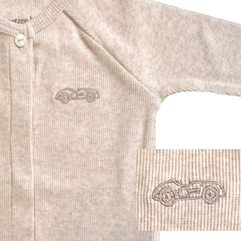 Een beige boxpakje