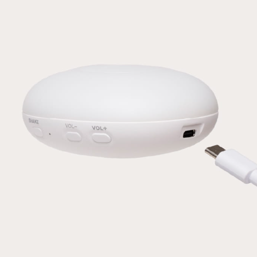 Knuffel in de vorm van een zeehond met een module met hartslag.